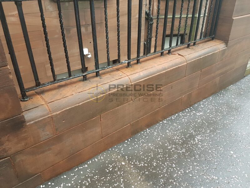Cleaning red sandstone in Glasgow